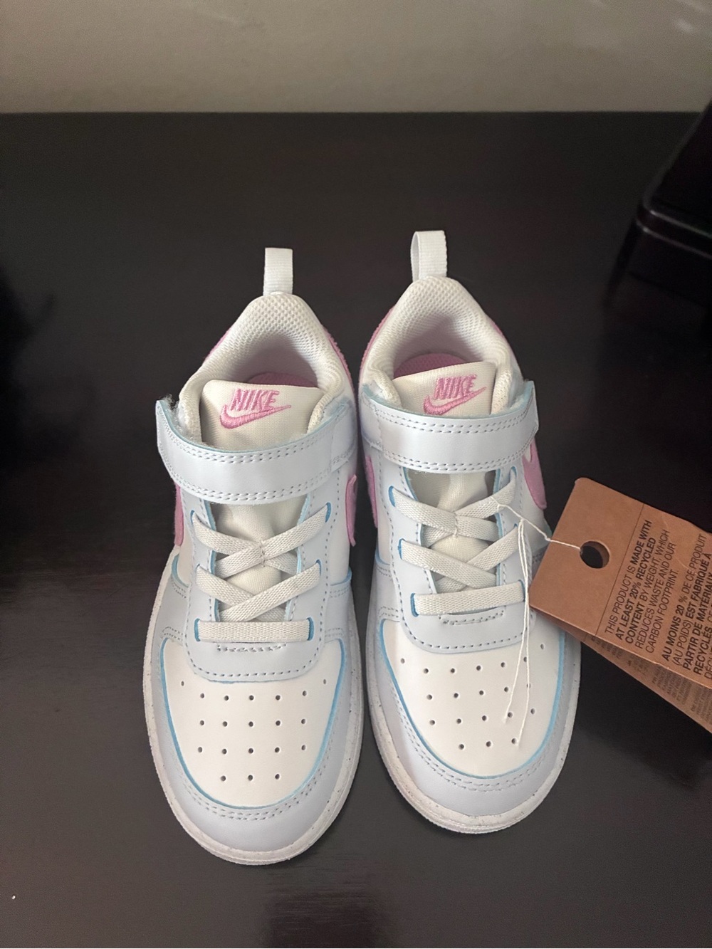 Nike Kids White Sneakers with Pink and Light Blue Accents